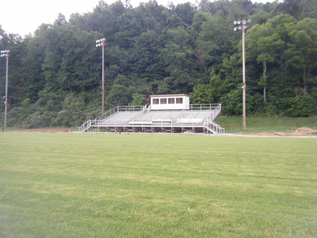 Existing structure needed a front walkway and for the structure to be cut back to get another lane on the running track