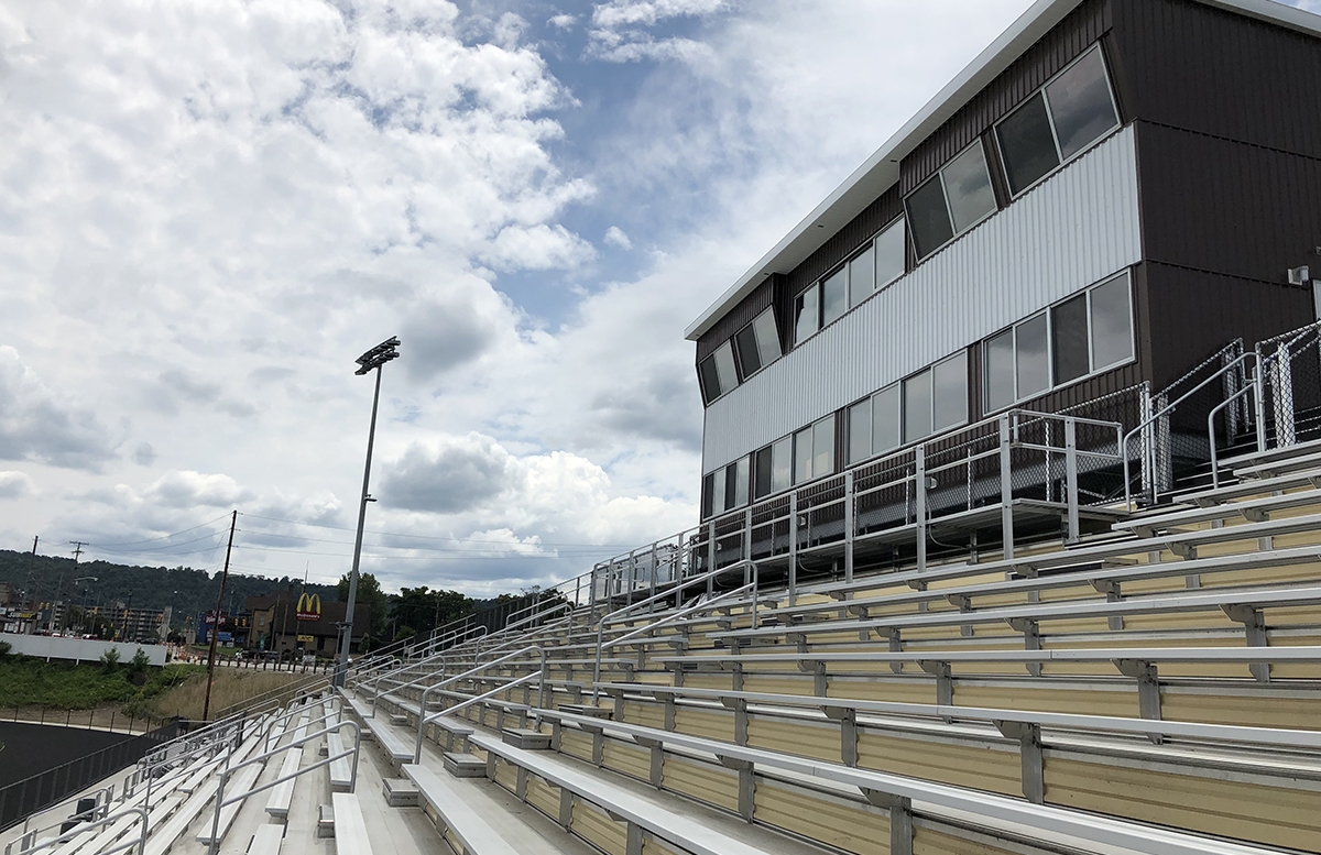 Aluminum bleachers featuring a press box