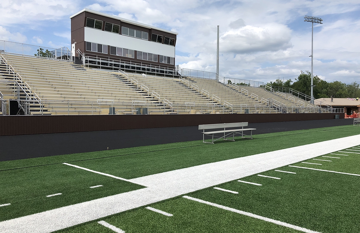 Aluminum bleacher seating featuring a press box